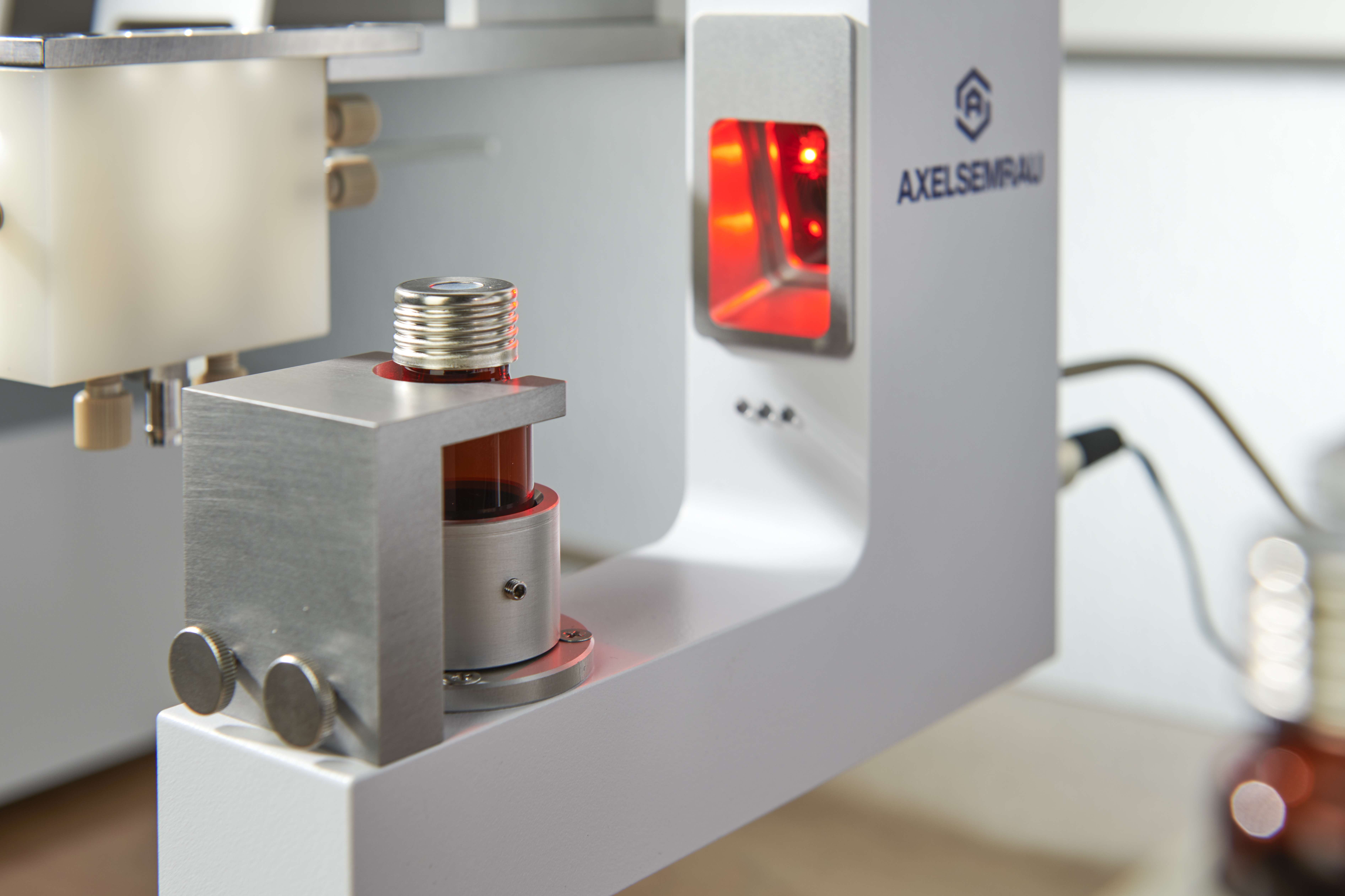 Barcode reader by Axel Semrau with labeled vial